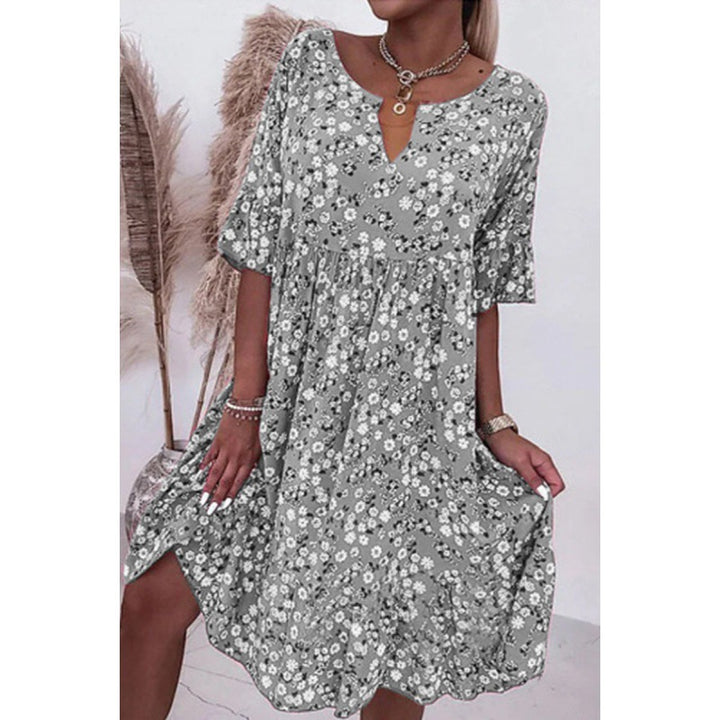 Vestido floral con manga media
