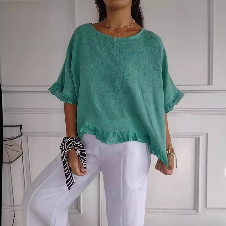 Blusa vaporosa con volantes