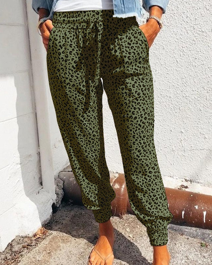 Pantalones holgados con estampado animal