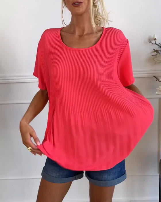Blusa plisada con cuello redondo