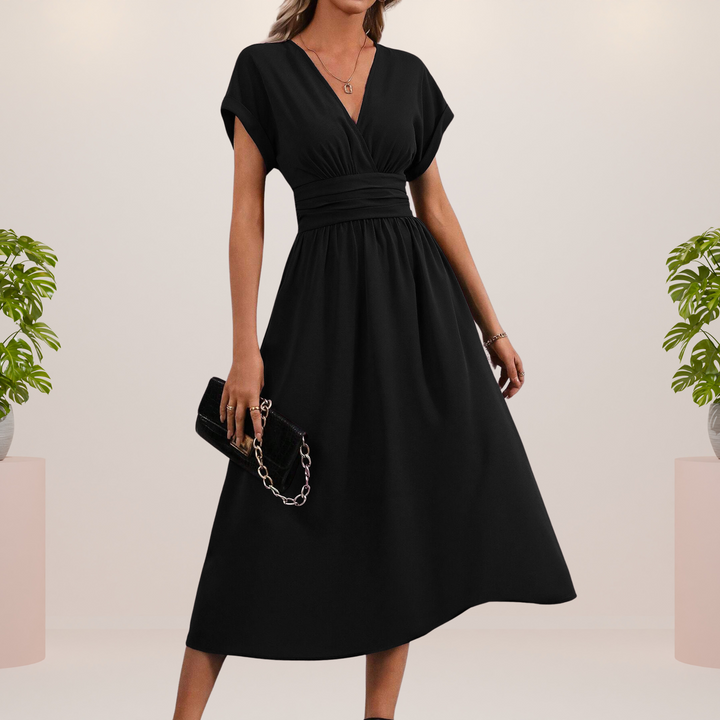 Elegante vestido midi con escote en V y lazo