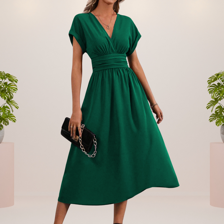 Elegante vestido midi con escote en V y lazo