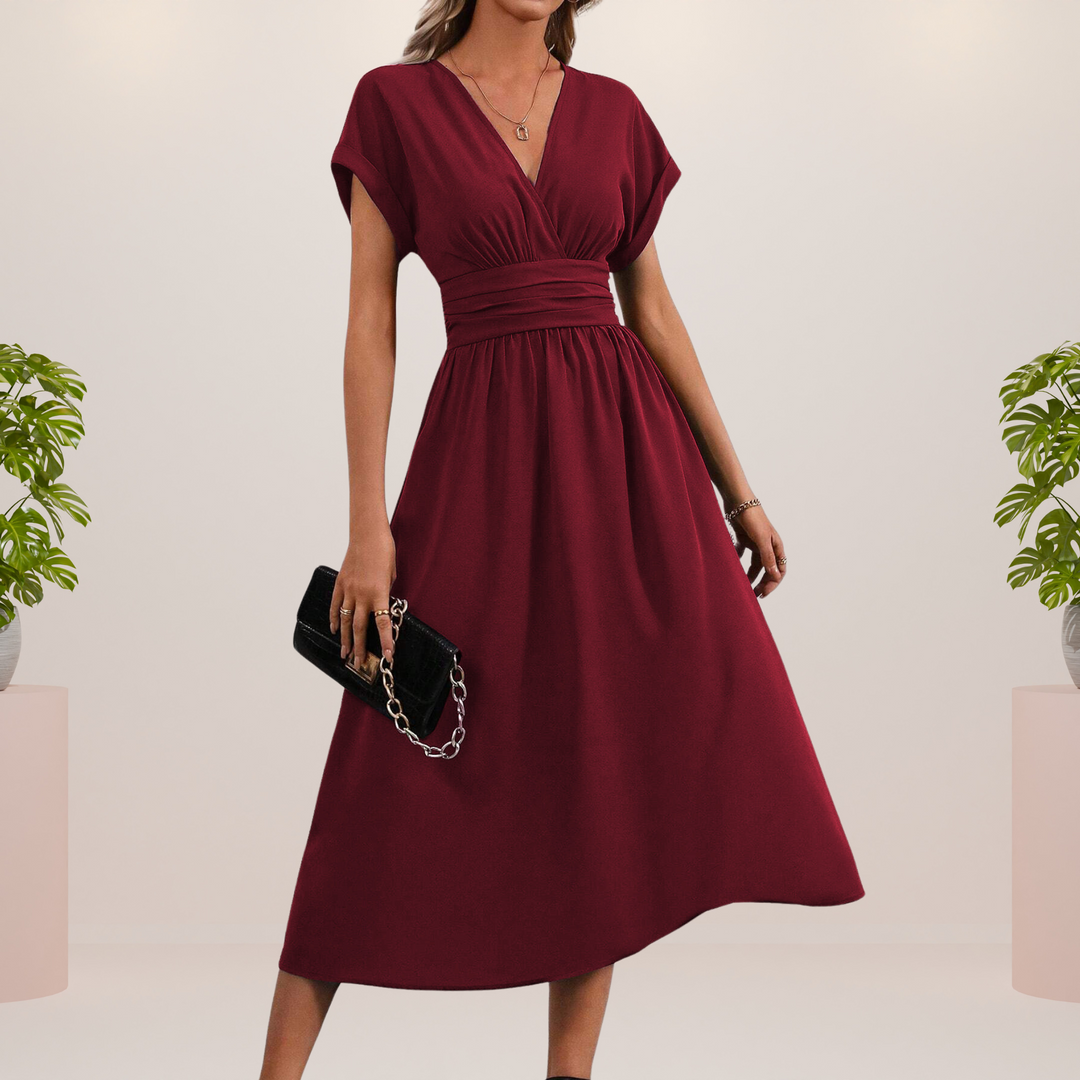 Elegante vestido midi con escote en V y lazo