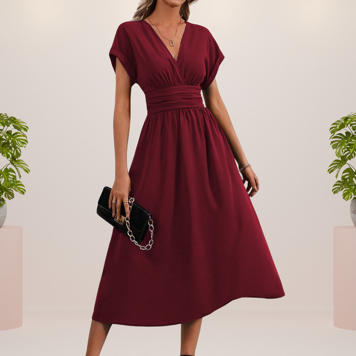 Elegante vestido midi con escote en V y lazo