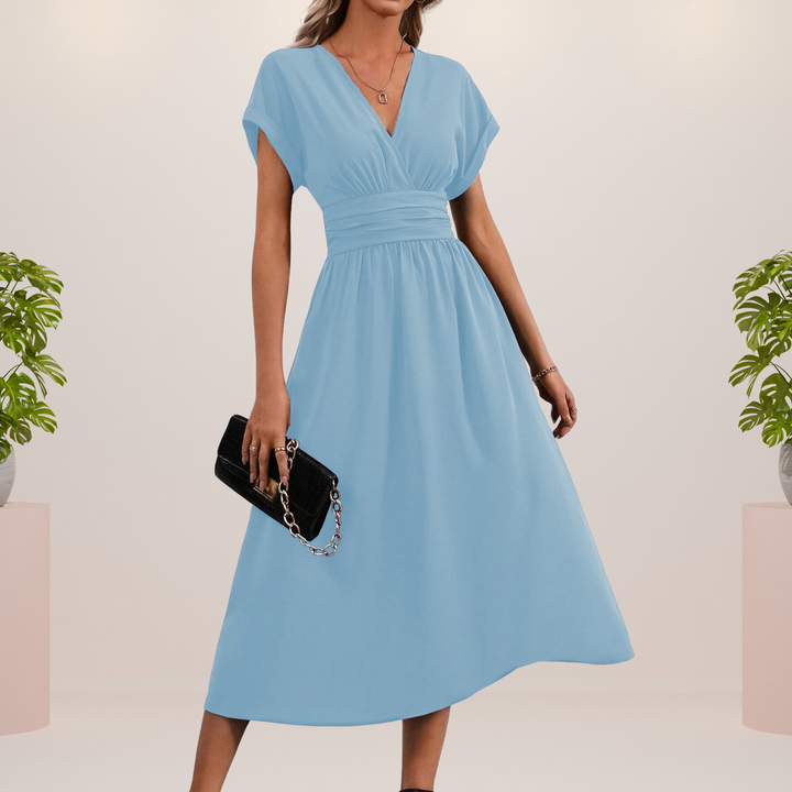 Elegante vestido midi con escote en V y lazo